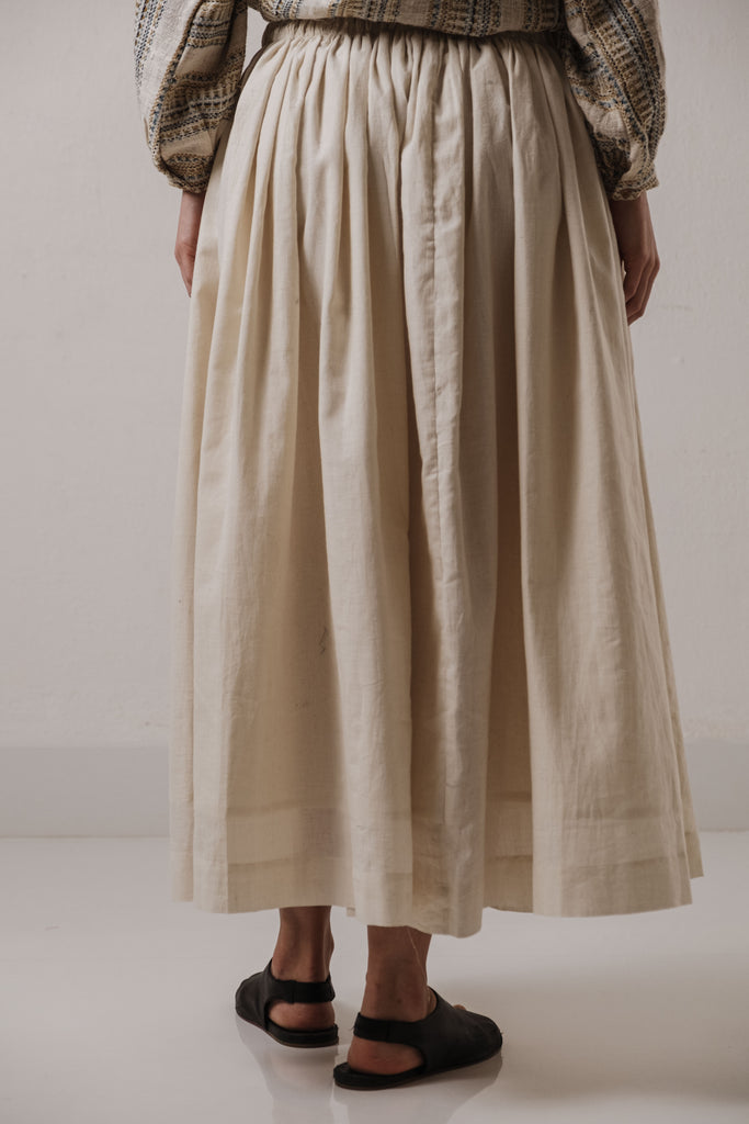 Off-white organic pleated skirt, sustainable fashion designers uk, sustainable fashion India, organic cotton clothing India, organic cotton jacket, most ethical clothing companies, most ethical clothing stores, casual living women's clothing catalog, clothing accessories for women, minimum clothing stockiest, minimum In