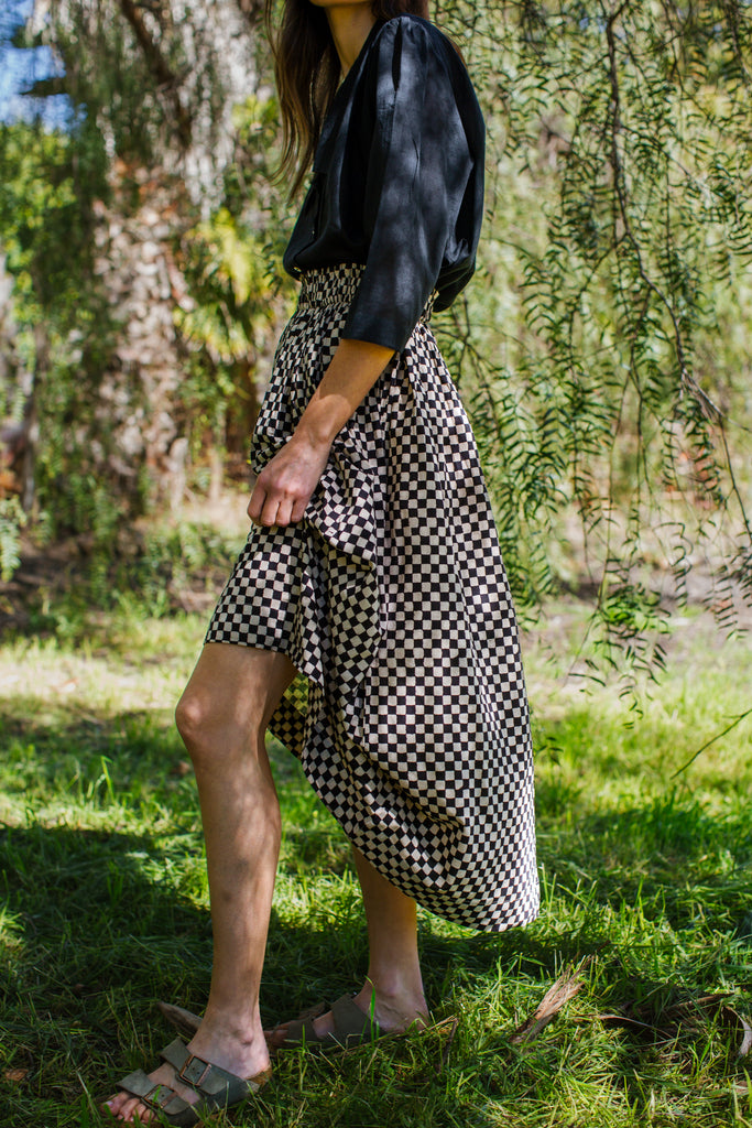 Checkered block printed, black and white skirt, ankle length, this skirt is made in collaboration between Erica Kim and World of Crow, smocked elasticated waist, sustainably made