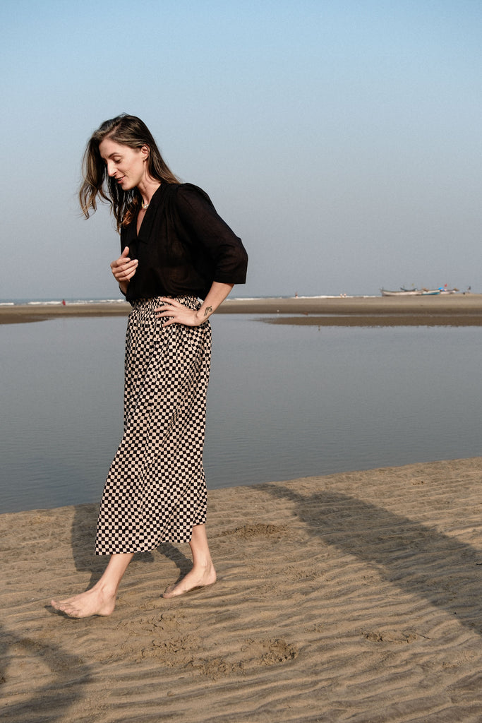 Checkered block printed, black and white skirt, ankle length, this skirt is made in collaboration between Erica Kim and World of Crow, smocked elasticated waist, sustainably made