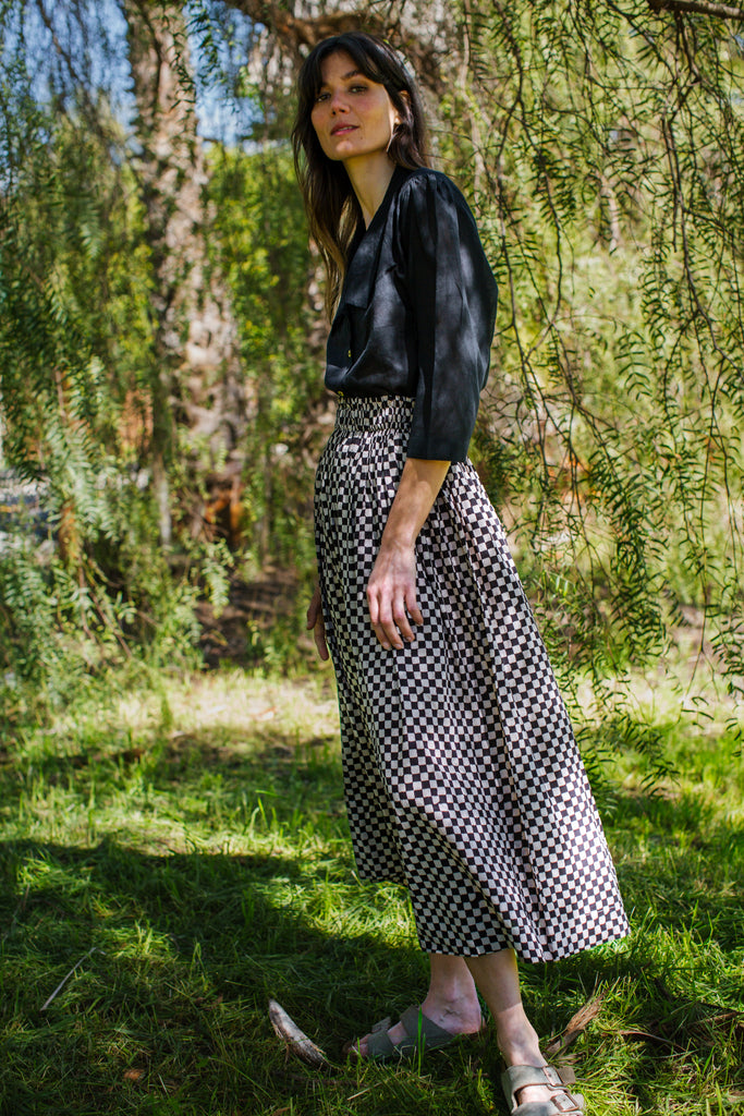 Checkered block printed, black and white skirt, ankle length, this skirt is made in collaboration between Erica Kim and World of Crow, smocked elasticated waist, sustainably made