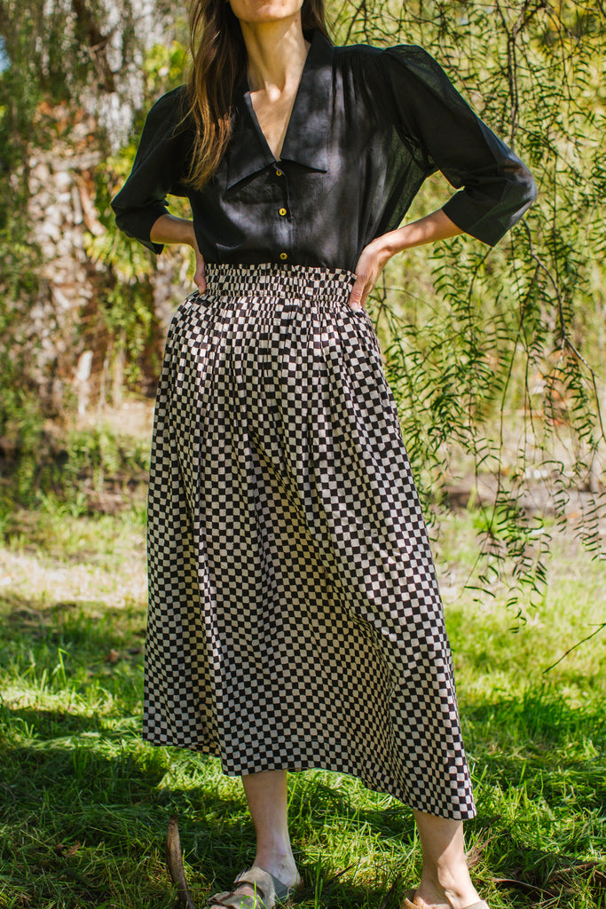 Checkered block printed, black and white skirt, ankle length, this skirt is made in collaboration between Erica Kim and World of Crow, smocked elasticated waist, sustainably made