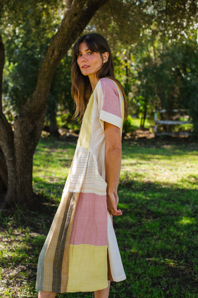 This dress is made in collaboration between Erica Kim @ahistoryofarchitecture and World of Crow, This dress has woven patches of different desert colors, it is made with handwoven fabric