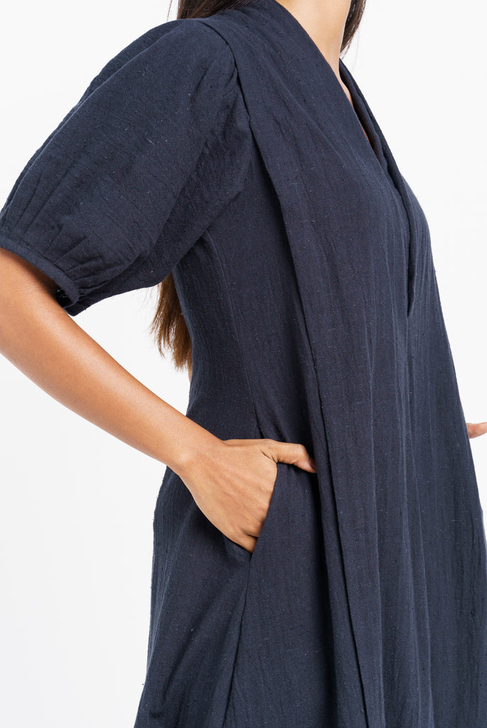 A classic ink black midi dress, best eco friendly fashion brands, best ethical clothing companies, thought organic clothing, wholesale organic clothing made in India, affordable organic cotton clothing, all natural clothing, quality women's clothing, quality women's clothing stores, women's minimalist wardrobe, closet essentials minimalist