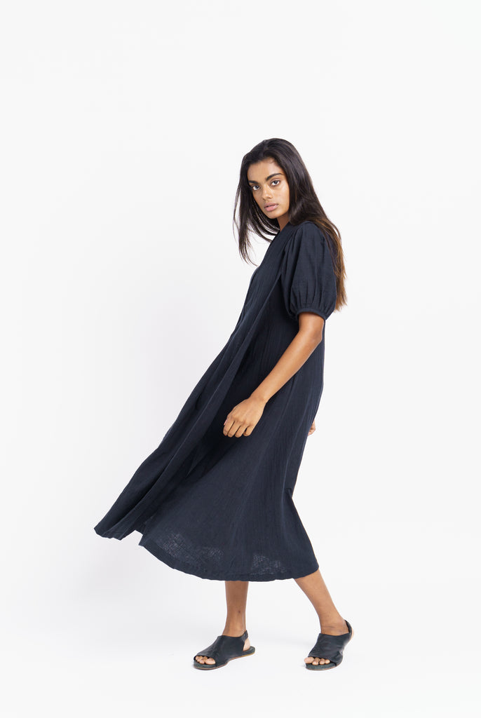 A classic ink black midi dress, best eco friendly fashion brands, best ethical clothing companies, thought organic clothing, wholesale organic clothing made in India, affordable organic cotton clothing, all natural clothing, quality women's clothing, quality women's clothing stores, women's minimalist wardrobe, closet essentials minimalist
