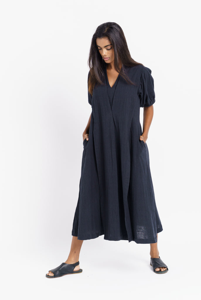 A classic ink black midi dress, best eco friendly fashion brands, best ethical clothing companies, thought organic clothing, wholesale organic clothing made in India, affordable organic cotton clothing, all natural clothing, quality women's clothing, quality women's clothing stores, women's minimalist wardrobe, closet essentials minimalist