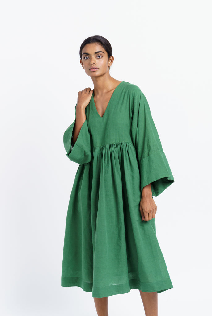 Basil green gathered midi dress, ethical and sustainable clothing, ethical clothing brands, organic cotton retailers, organic cotton shop, cotton clothing company, natural cotton clothing, India women's clothing, India women's clothing stores, create a minimalist closet, dark minimalist fashion