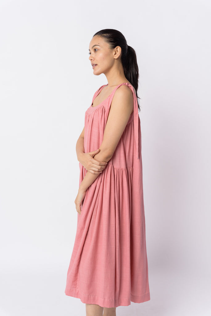 Candy pink tie-up dress, best ethical clothing brands India, best sustainable clothing brands, organic cotton wear, organic dresses online, cotton only clothing, cotton only clothing store, women's organic dresses, lightweight cotton women's clothing, clothing brands for minimalists, design minimalist wardrobe