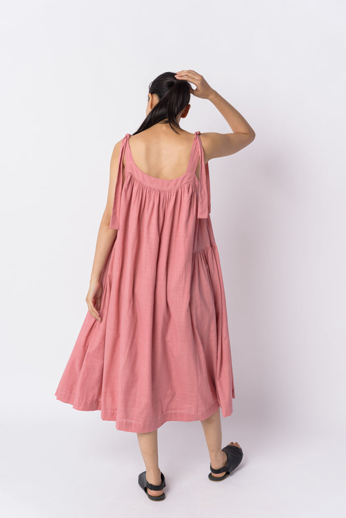 Candy pink tie-up dress, best ethical clothing brands India, best sustainable clothing brands, organic cotton wear, organic dresses online, cotton only clothing, cotton only clothing store, women's organic dresses, lightweight cotton women's clothing, clothing brands for minimalists, design minimalist wardrobe