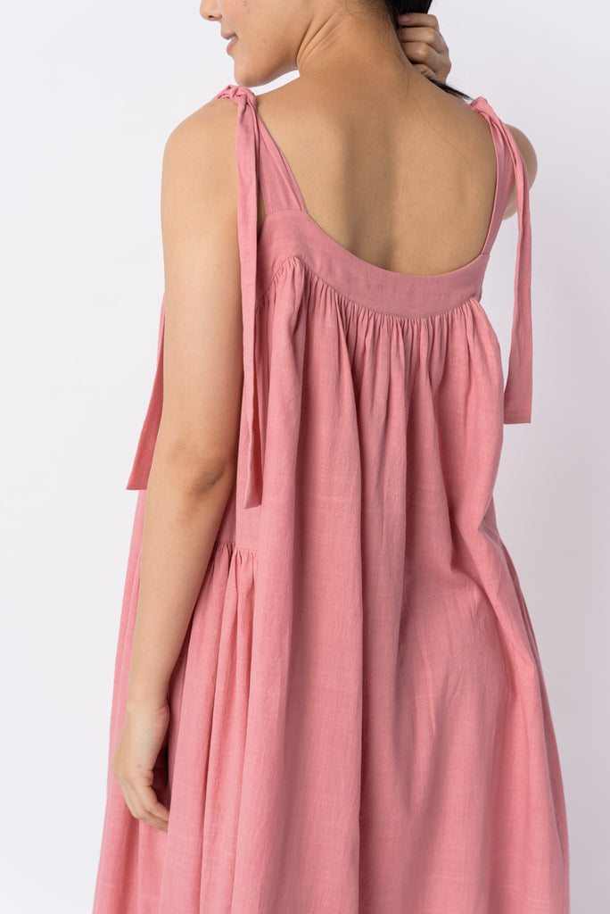 Candy pink tie-up dress, best ethical clothing brands India, best sustainable clothing brands, organic cotton wear, organic dresses online, cotton only clothing, cotton only clothing store, women's organic dresses, lightweight cotton women's clothing, clothing brands for minimalists, design minimalist wardrobe