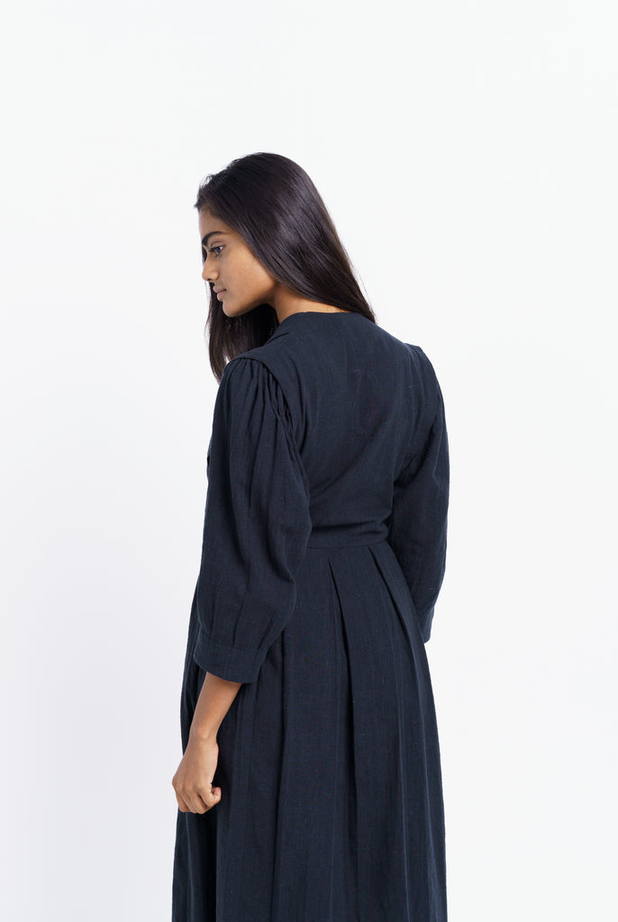 Iconic wrap-around midi dress, top ethical brands, top sustainable clothing companies, organic dress, organic fabrics for clothing, cotton top clothing, cotton up clothing, fair trade womens clothing, good clothing brands for women, professional minimalist wardrobe, simple clothing brands
