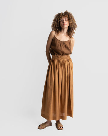 Matte brown gathered skirt, sustainable clothing brands dresses, sustainable dress brands, best organic cotton clothing, clothes made from organic cotton, cotton clothing for women, cotton clothing store, 100 organic cotton women's clothing, 100 percent cotton women's clothing, minimalist wear, how to be a minimalist with clothes