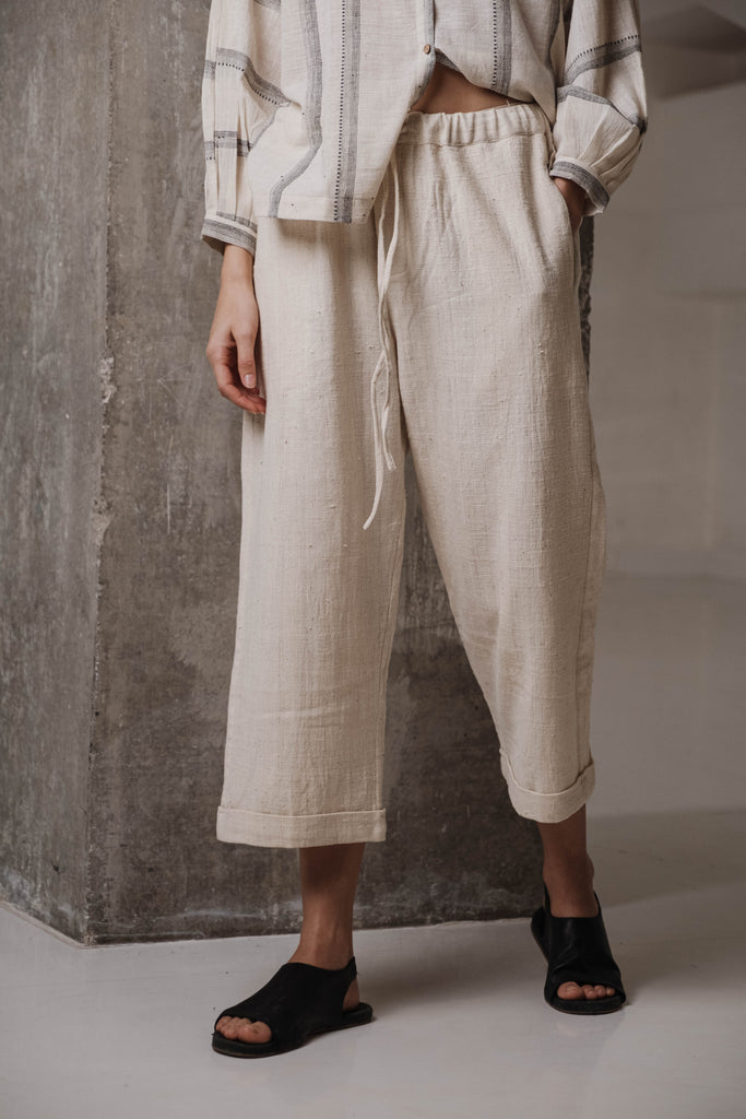 Off-white organic barrel-fit pants, sustainable brands India, sustainable clothing manufacturers, organic clothing manufacturers India, organic clothing wholesale, made fair clothing, made in India clothing, bamboo cotton women's clothing, bamboo women's clothing fashion, minima clothing, minima India clothing