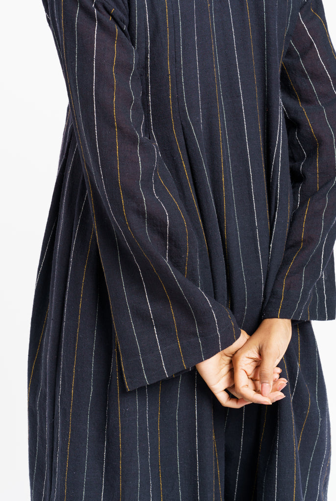 Striped relaxed fit midi dress, sustainable wear, top 10 sustainable clothing brands, organic cotton online, organic cotton dress, clothing brands with natural fibers, cotton and company clothing, ethically made women's clothing, ever lane women's dresses, minimalist wardrobe guide, minimalist wholesale clothing