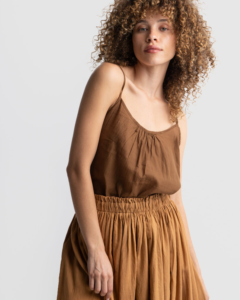 Matte brown gathered skirt, sustainable clothing brands dresses, sustainable dress brands, best organic cotton clothing, clothes made from organic cotton, cotton clothing for women, cotton clothing store, 100 organic cotton women's clothing, 100 percent cotton women's clothing, minimalist wear, how to be a minimalist with clothes