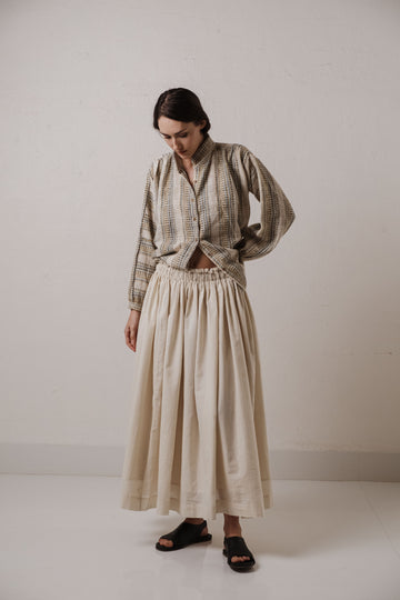 Off-white organic pleated skirt, sustainable fashion designers uk, sustainable fashion India, organic cotton clothing India, organic cotton jacket, most ethical clothing companies, most ethical clothing stores, casual living women's clothing catalog, clothing accessories for women, minimum clothing stockiest, minimum In